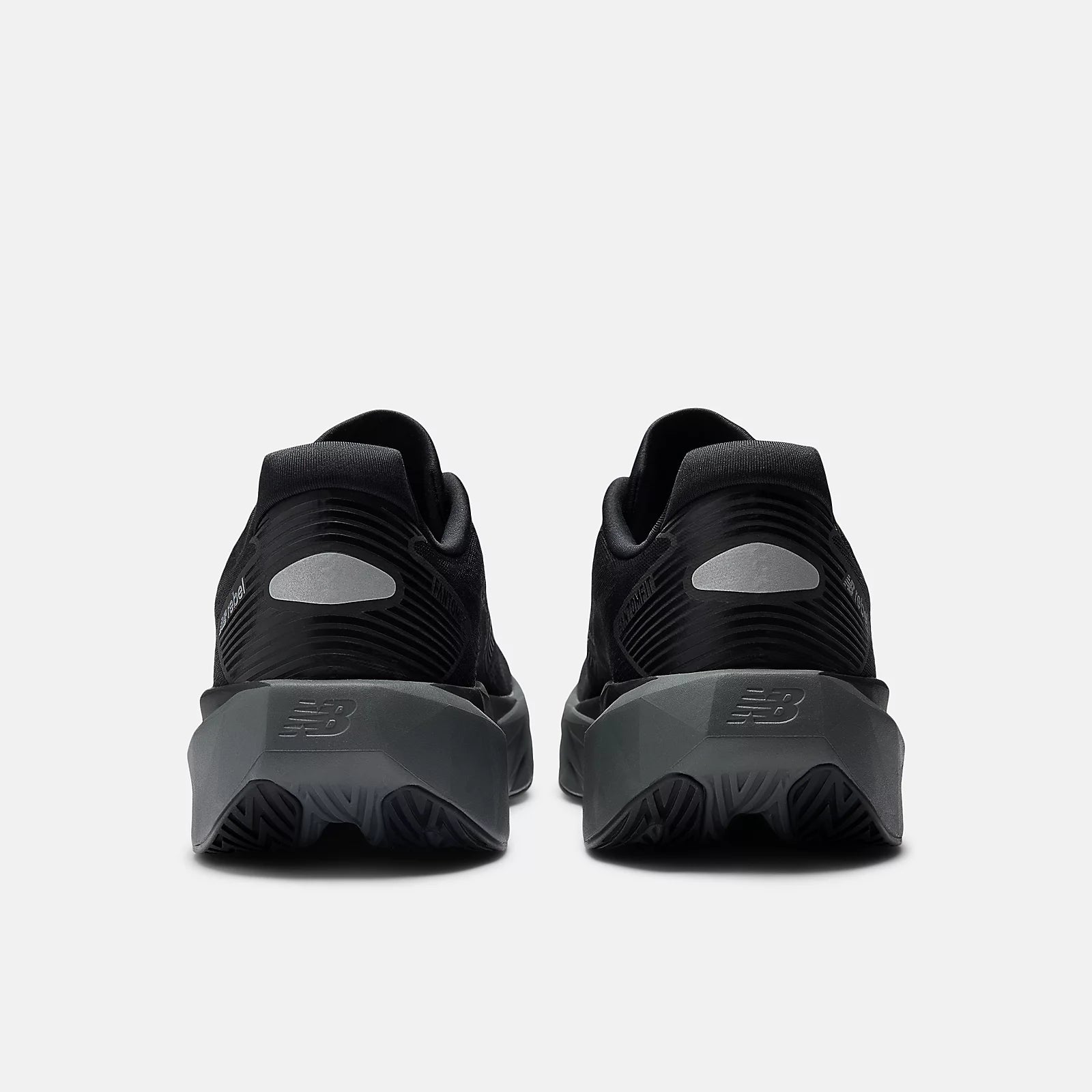 New Balance Men's FuelCell Rebel V5 Running Shoe - Black with Castlerock and Silver Metallic