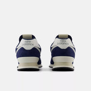 New Balance Unisex 574 V2 Varsity Suede Sneaker - Navy with Sea Salt
